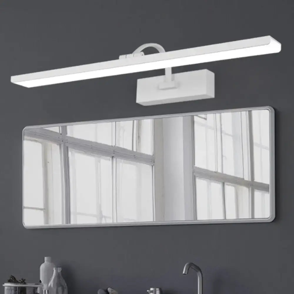 White LED vanity sconce with curved arm mounted over a rectangular mirror on Tampa Home & Garden Store