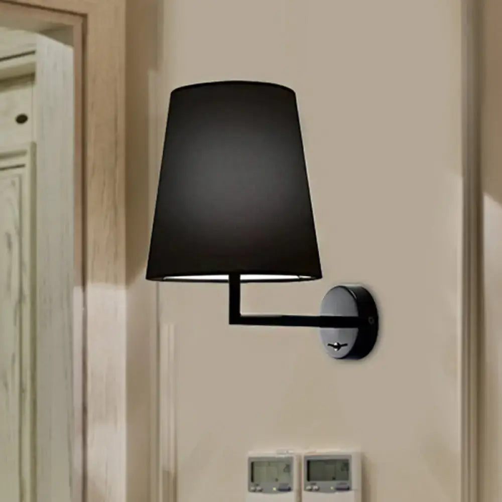 White Fabric Cone LED Wall Sconce with black metal arm and round backplate on Tampa Home & Garden Store
