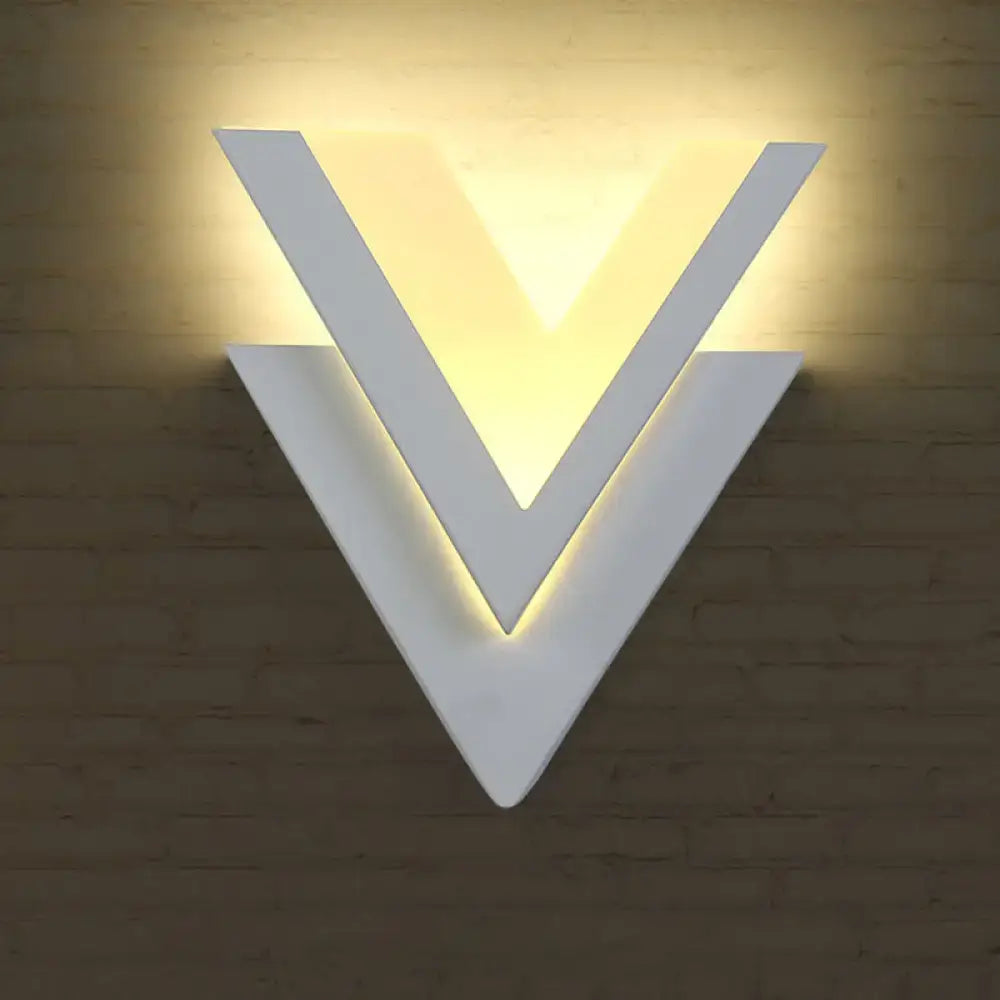 White V-shaped wall light by Decorbites, modern LED wall lamp with warm backlighting on Tampa Home & Garden Store