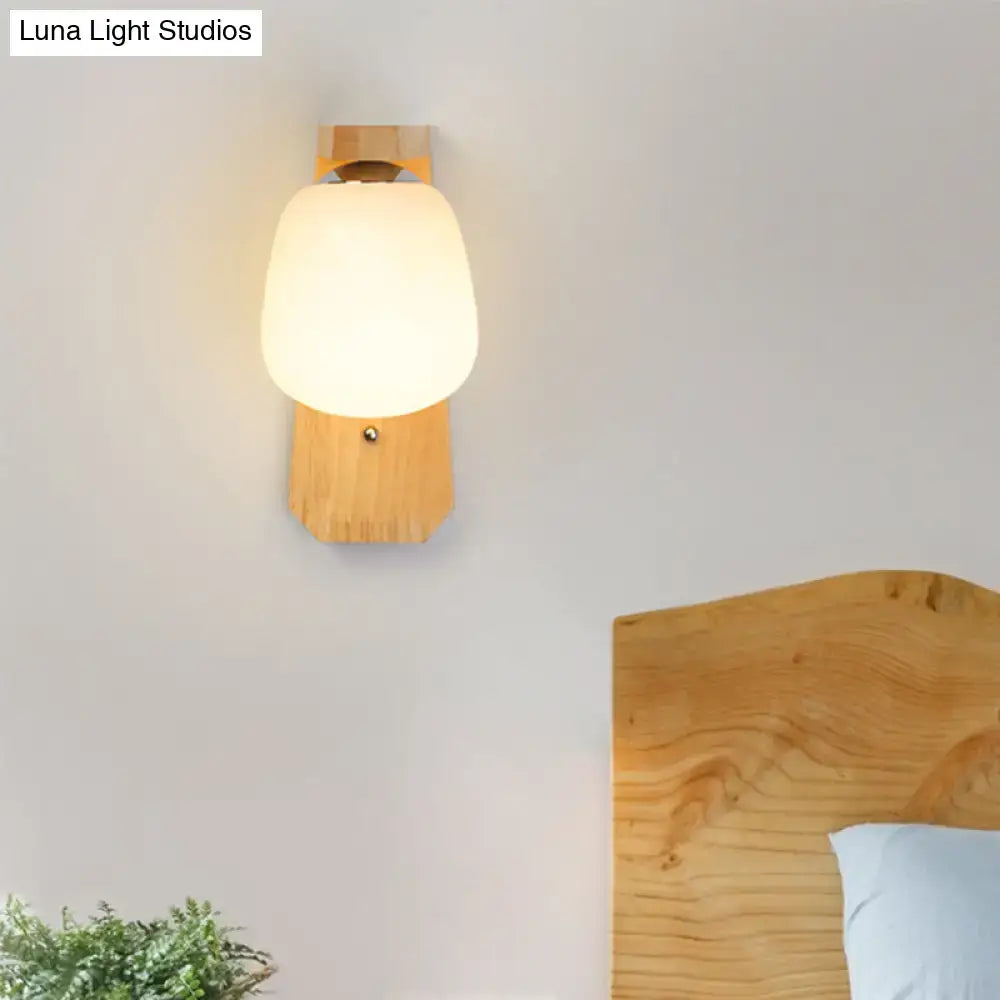 Wooden Globe Wall Lamp by Decorbites with frosted glass globe and natural wood backplate on Tampa Home & Garden Store