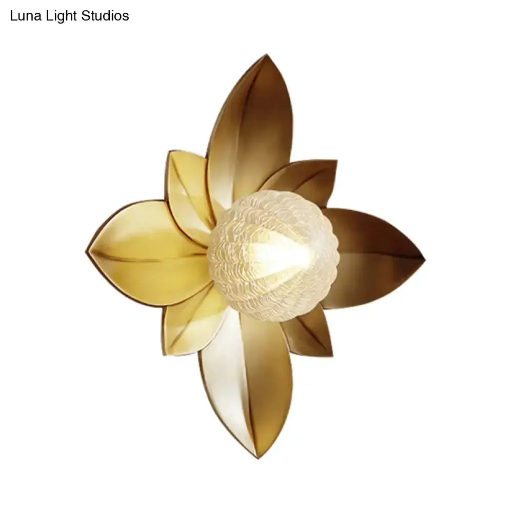 Modernist gold flower wall sconce with frosted glass center by Decorbites on Tampa Home & Garden Store