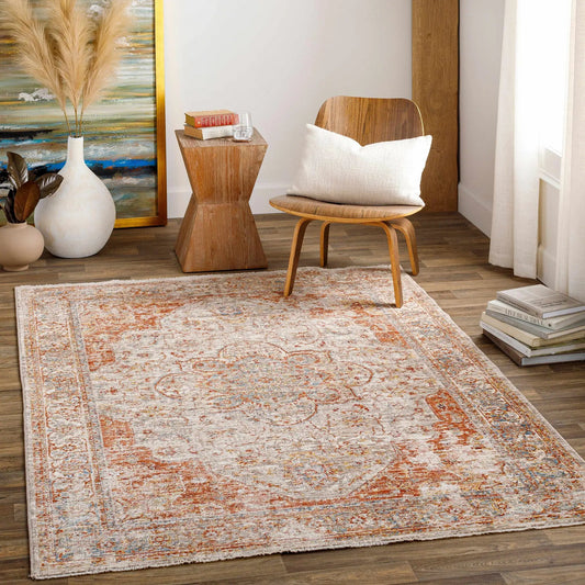 Marieville Luxe Performance Rug by Boutique Rugs in warm cream with orange border texture on Tampa Home & Garden Store