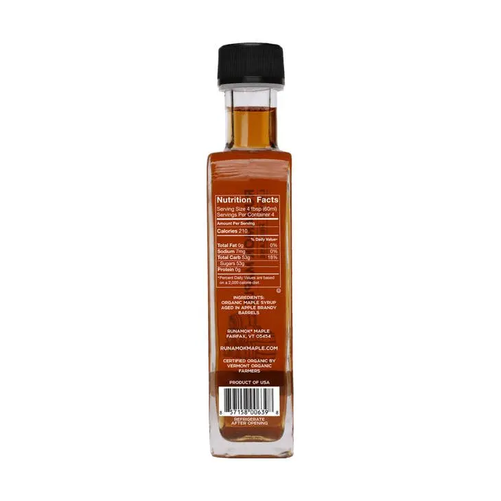 Limited Apple Brandy Barrel-Aged Maple Syrup bottle; amber maple syrup in a glass on Tampa Home & Garden Store