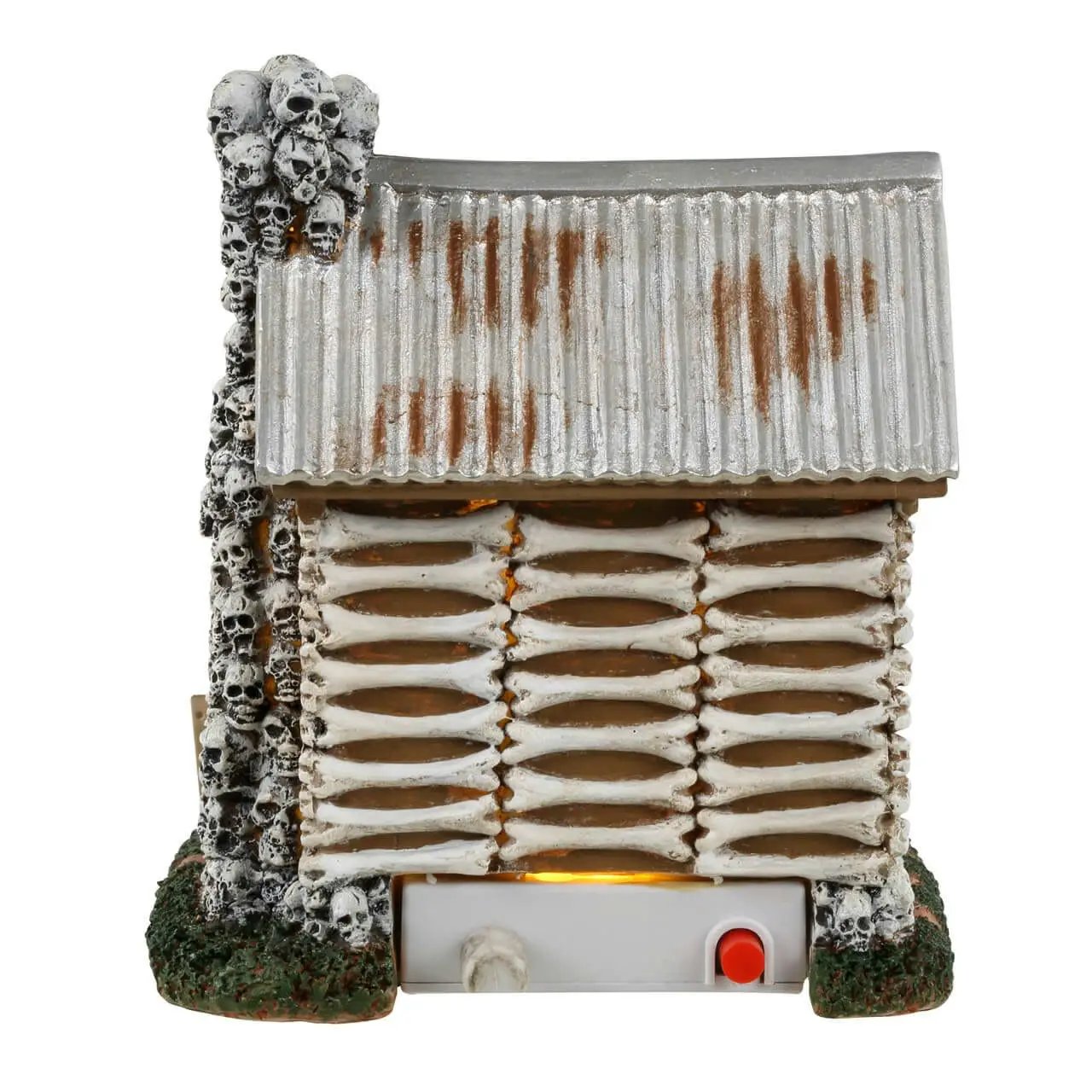 Lemax Spookytown Skeleton Cottage with skull chimney and ribbed metal roof warm glow on Tampa Home & Garden Store