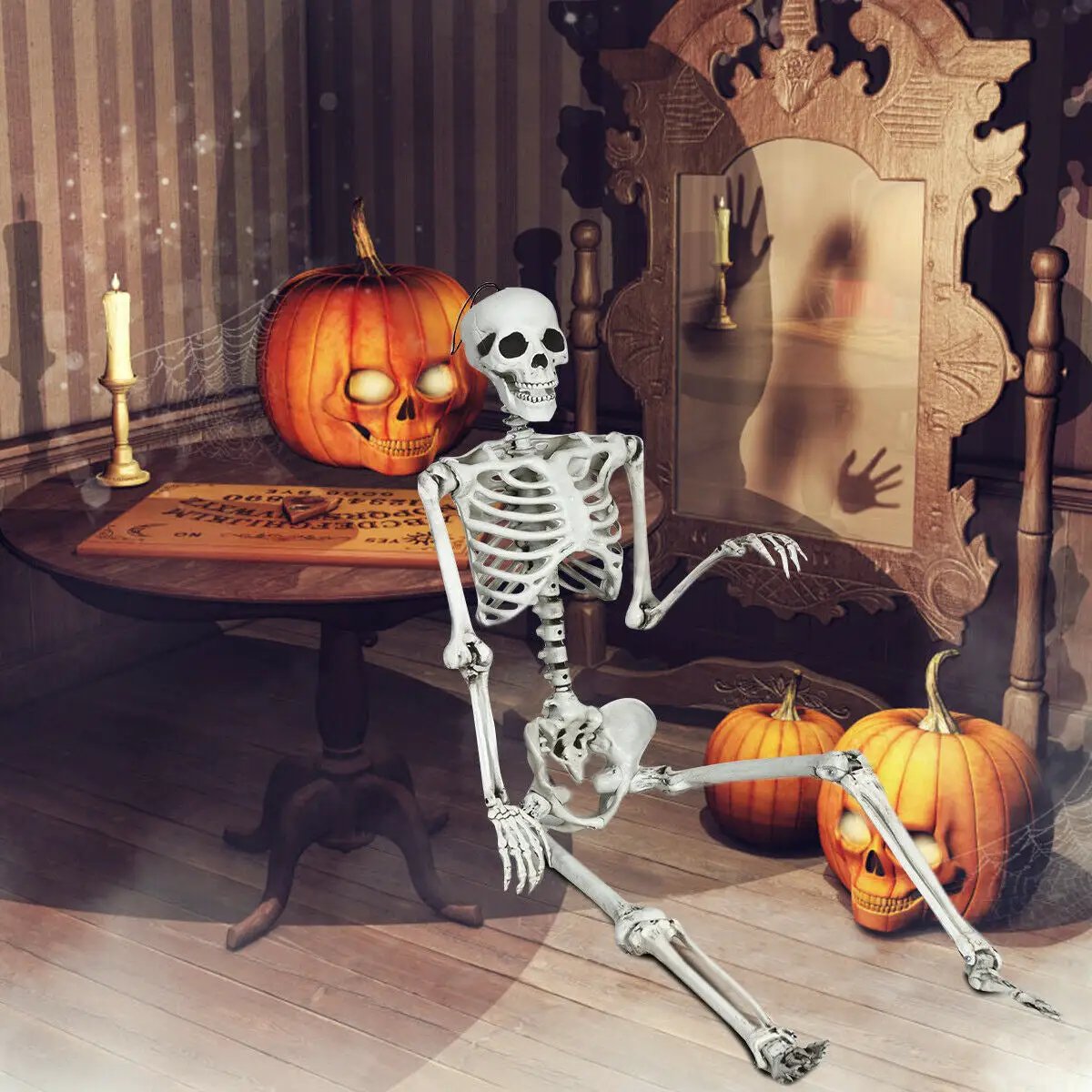 Life Size Halloween Skeleton prop, white plastic, seated beside pumpkins and ornate mirror on Tampa Home & Garden Store