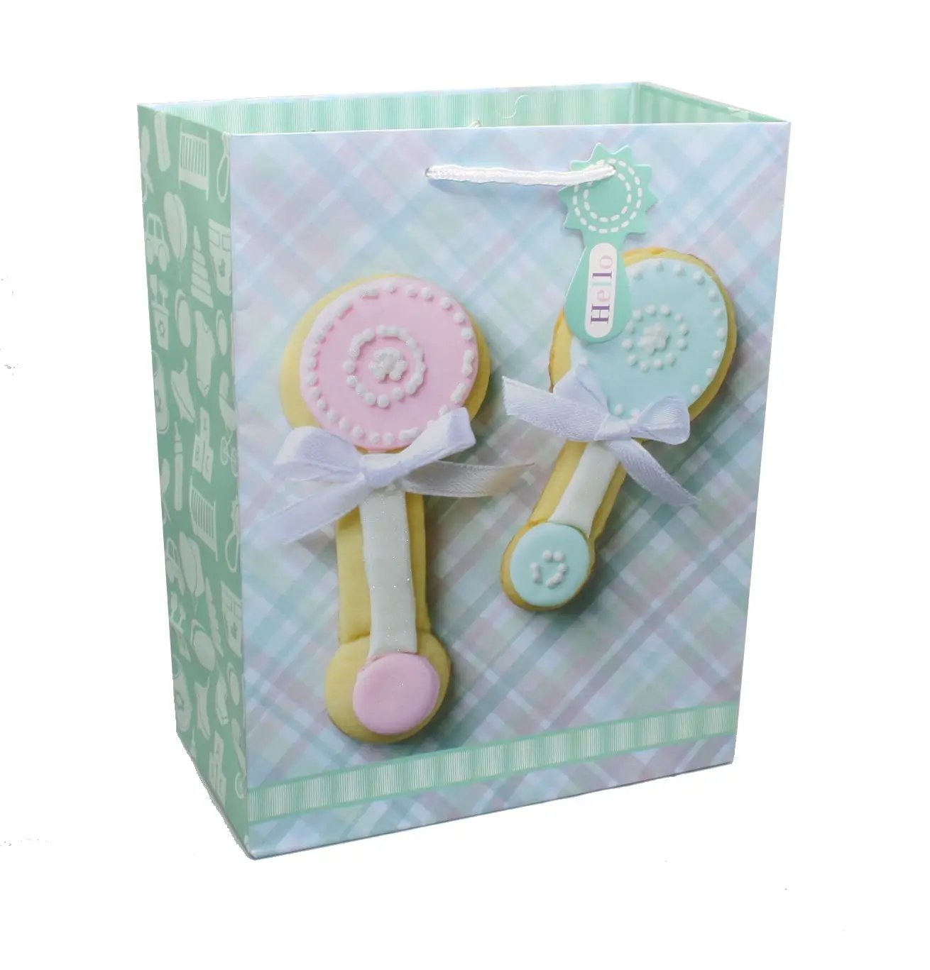 Pink and blue baby rattle gift bag with two pastel rattles, white ribbon bows, plaid background on Tampa Home & Garden Store