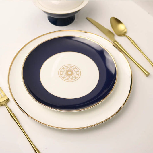 Four Sapphire Blue Jewel salad plates; navy center, white ring, gold trim by Little White Dish on Tampa Home & Garden Store