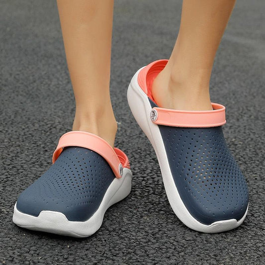 Stevvex navy perforated garden sandals pair with pink adjustable strap, slip-on water shoes on Tampa Home & Garden Store