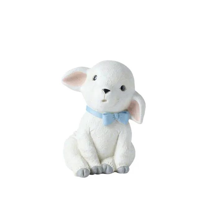 Ludolf Lamb Plush Toy white lamb with blue bow, seated figurine The Country Christmas Loft on Tampa Home & Garden Store