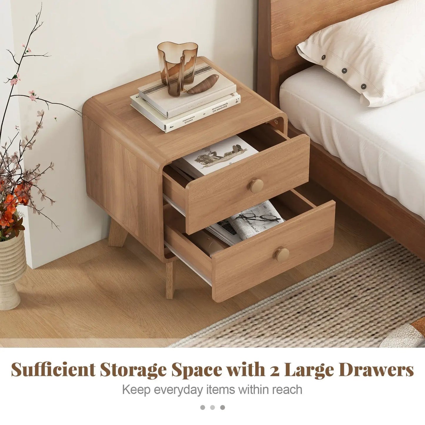 Nightstand with 2 drawers in natural rubber wood finish; top holds books and amber vase on Tampa Home & Garden Store