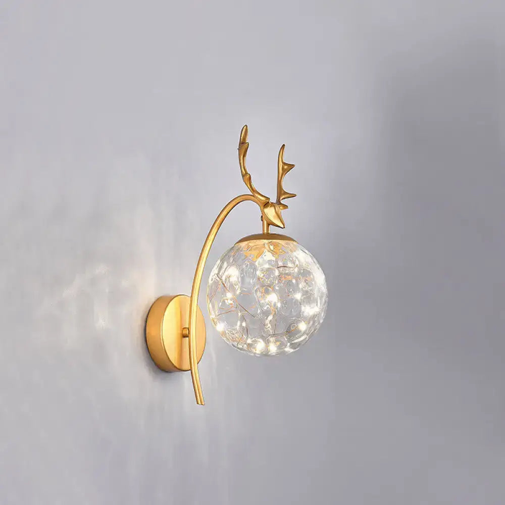 Black Antler Wall Sconce gold-tone metal arm with crystal glass orb lights by Decorbites on Tampa Home & Garden Store