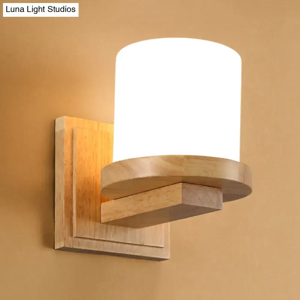 Wood Opal Wall Sconce by Decorbites with backplate and curved arm supporting an opal shade on Tampa Home & Garden Store