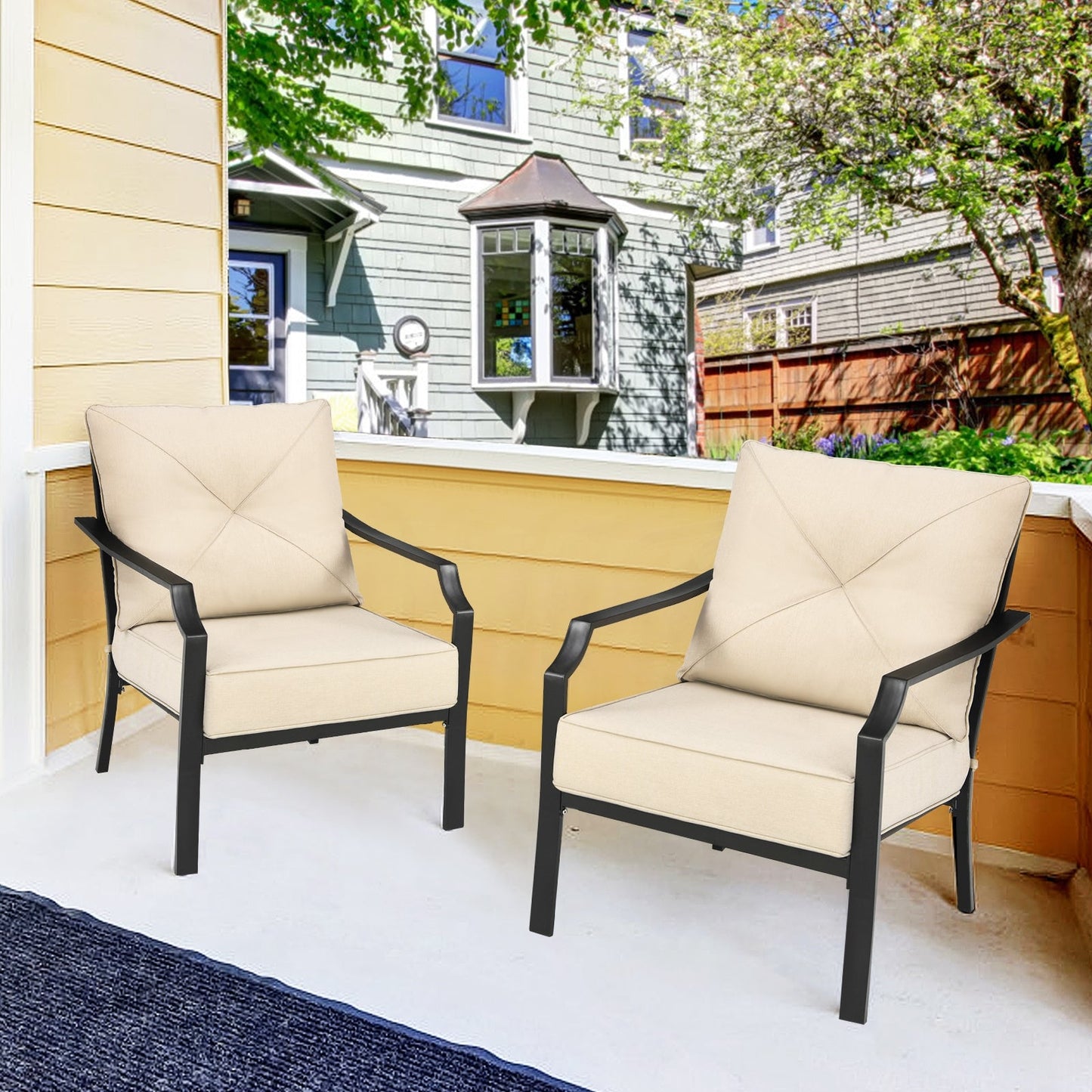 Two-piece patio dining set with padded beige cushions and black steel frames DirectDeals on Tampa Home & Garden Store