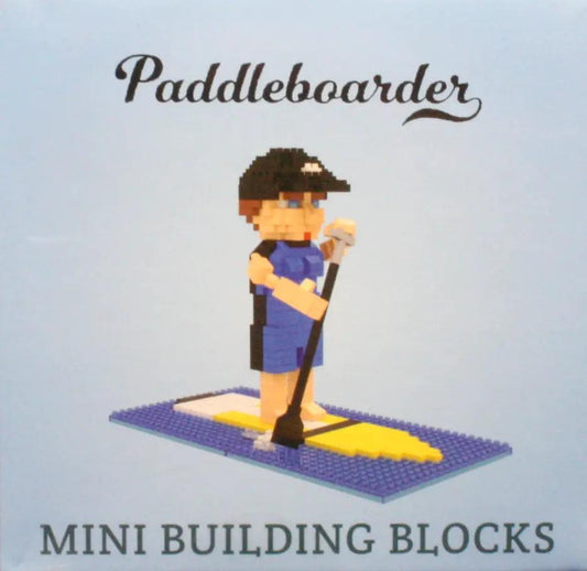 Mini Building Blocks paddleboarder figure on blue base plate with yellow paddleboard on Tampa Home & Garden Store