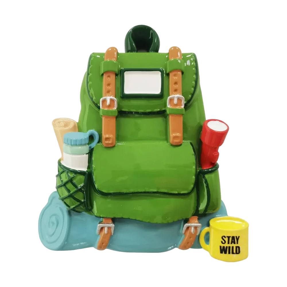 Green hiking backpack ornament with camping gear, blue roll mat and yellow Stay Wild mug on Tampa Home & Garden Store