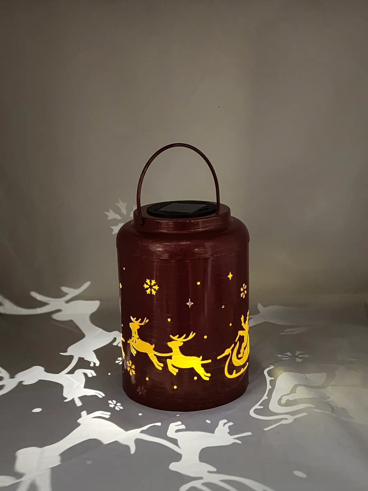 Solar Santa Lantern with Festive Scene, red metal lantern with reindeer, solar glow on Tampa Home & Garden Store