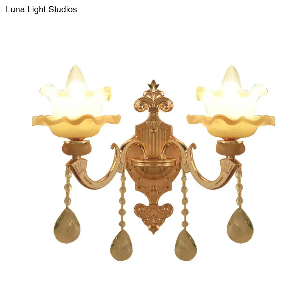 Gold frosted glass dual-bulb sconce by Decorbites with backplate and crystal teardrops on Tampa Home & Garden Store