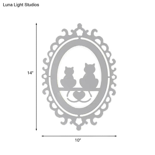 Gray cat wall light with ornate oval frame and two cat silhouettes by Decorbites on Tampa Home & Garden Store