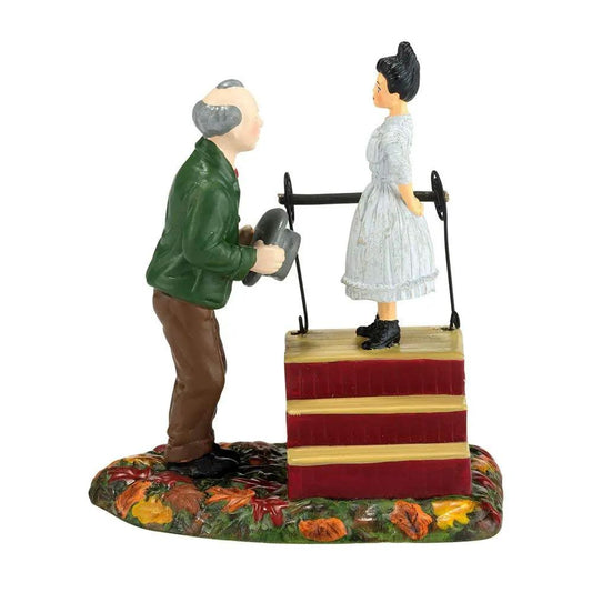Halloween Village Spellbound Hypno Girl Figurine with man offering hat on floral base on Tampa Home & Garden Store