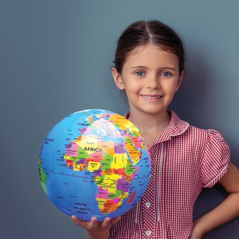 Our World 12 Inch Inflatable Globe educational kids globe blue with continents held by girl on Tampa Home & Garden Store