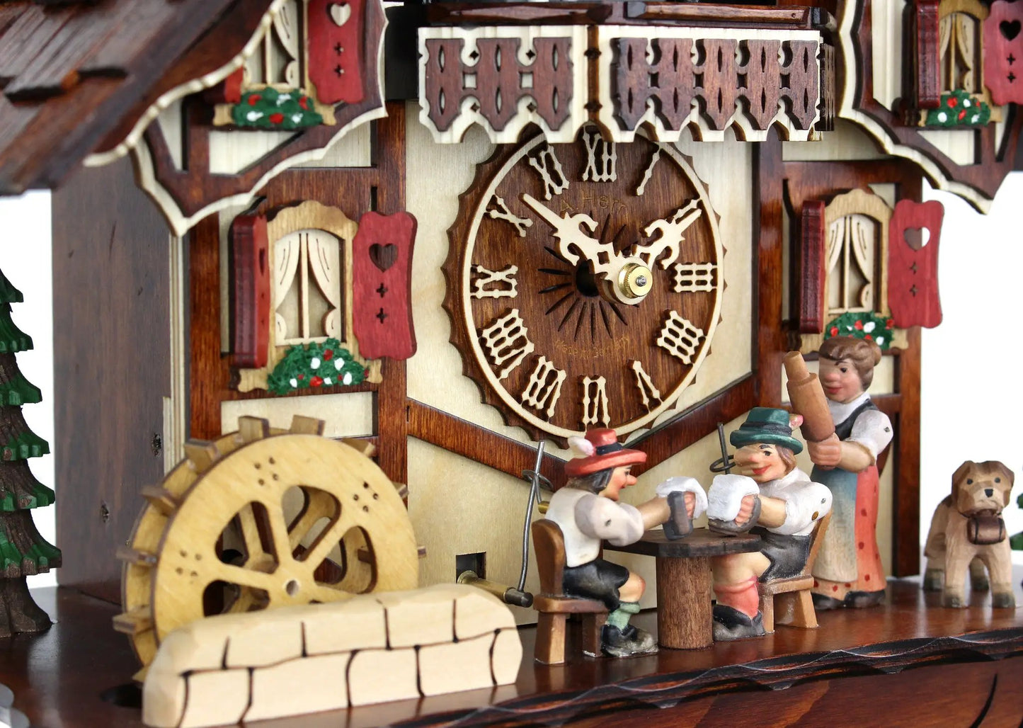 The Tipsy Brothers HerrZeit cuckoo clock, ornate wooden Bavarian wall clock with carved dial on Tampa Home & Garden Store