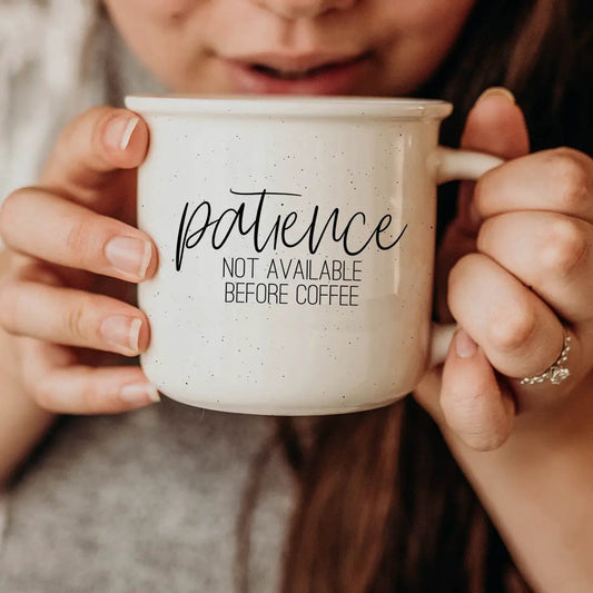 Not Yet Caffeinated Patience Mug Morning Brew white speckled ceramic mug held in hands on Tampa Home & Garden Store