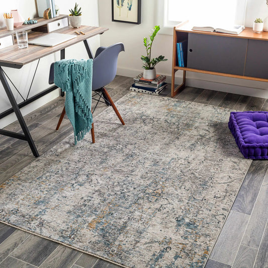 Pence Luxe Fringe Rug beige and charcoal with fringe edges in a modern home office on Tampa Home & Garden Store