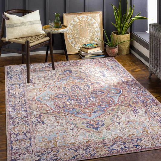 Neyland Iris olive and brown area rug by Boutique Rugs with ornate medallion motif on floor on Tampa Home & Garden Store