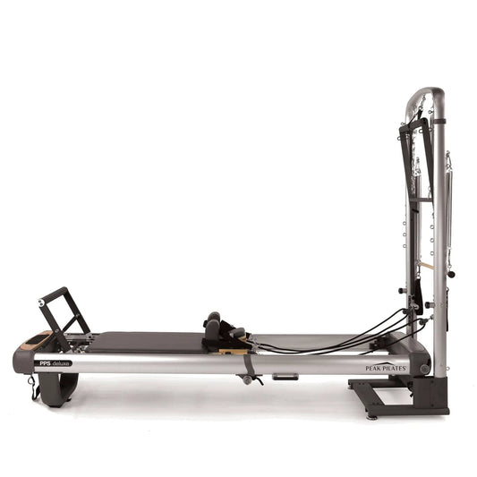 Peak Pilates PPS Deluxe 3-in-1 home reformer with steel frame and black straps on Tampa Home & Garden Store