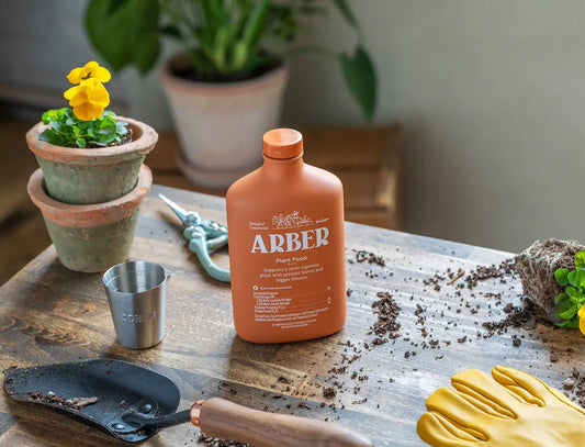 Organic Plant Food 16oz liquid fertilizer orange plastic bottle Arber Plant Food for houseplants on Tampa Home & Garden Store