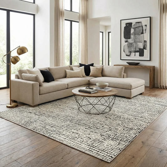 Keita Cream and Black Grid Plush Rug with cream base and black grid pattern in a modern living room on Tampa Home & Garden Store