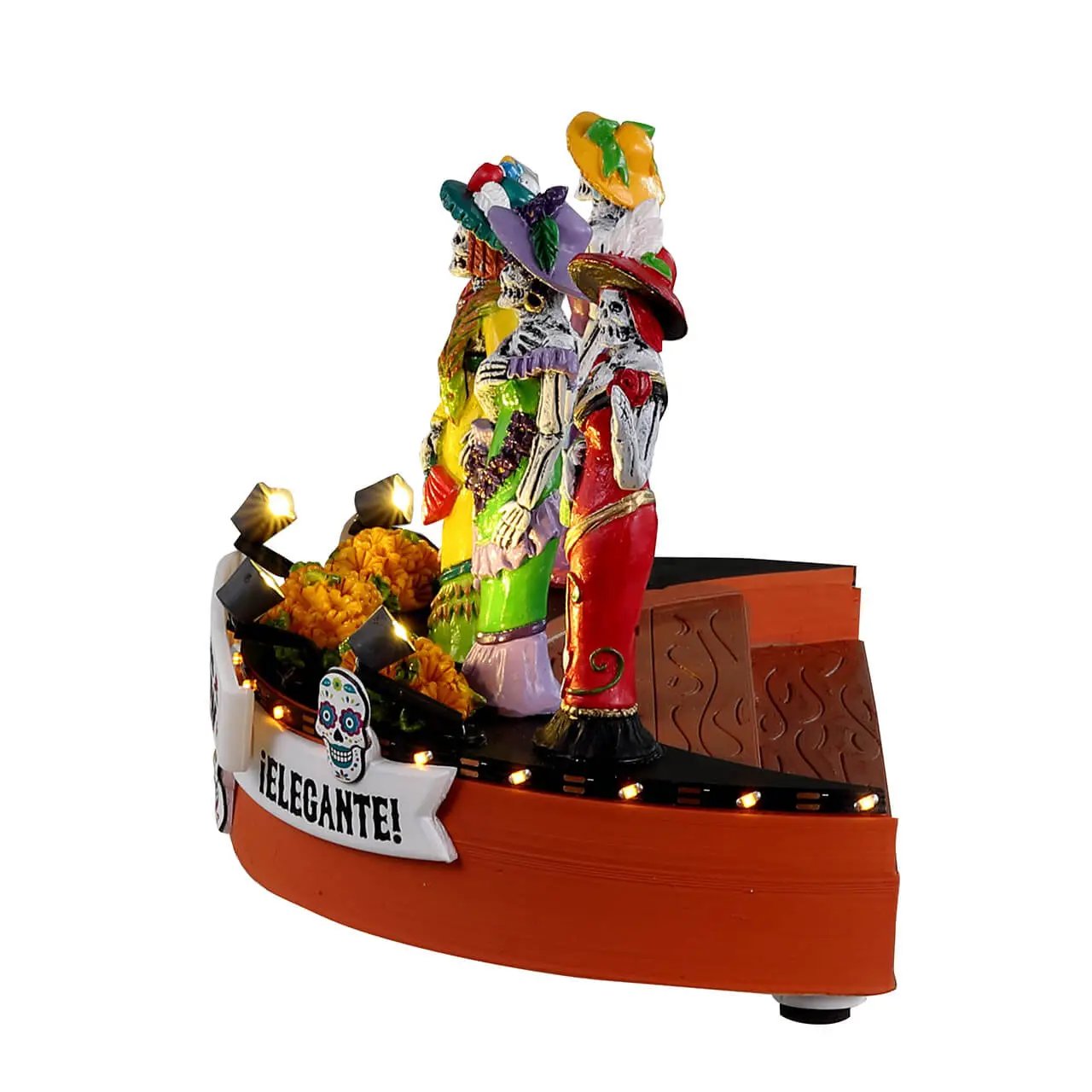 Catrinas Dia De Muertos fashion show figurine on Halloween village display with marigolds on Tampa Home & Garden Store
