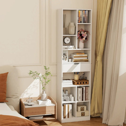 White 7-tier floorstanding bookshelf with drawer, styled with books and decorative vase on Tampa Home & Garden Store