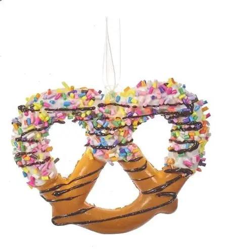 Frosted Chocolate Covered Pretzel Ornament with sprinkles and chocolate drizzle hanging on Tampa Home & Garden Store