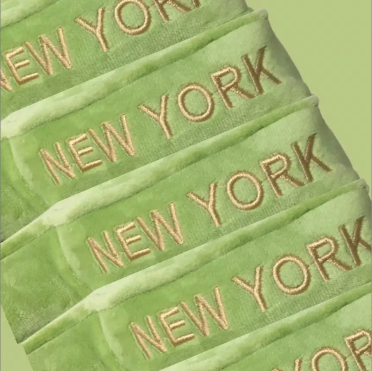 New York State Handcrafted Stuffed Plush Doll with lime green fabric and embroidered NEW YORK text on Tampa Home & Garden Store
