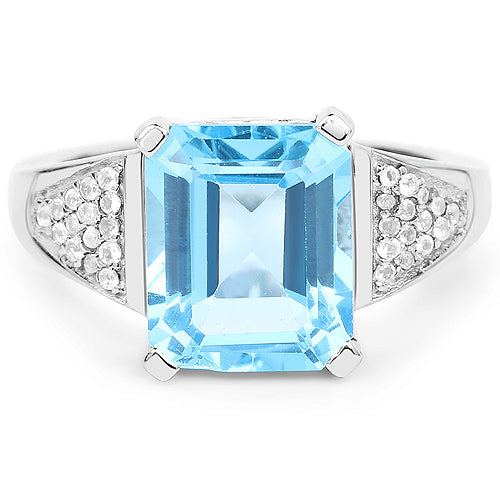 Ring with emerald-cut Swiss blue topaz center and white topaz pavé shoulders .925 sterling silver on Tampa Home & Garden Store