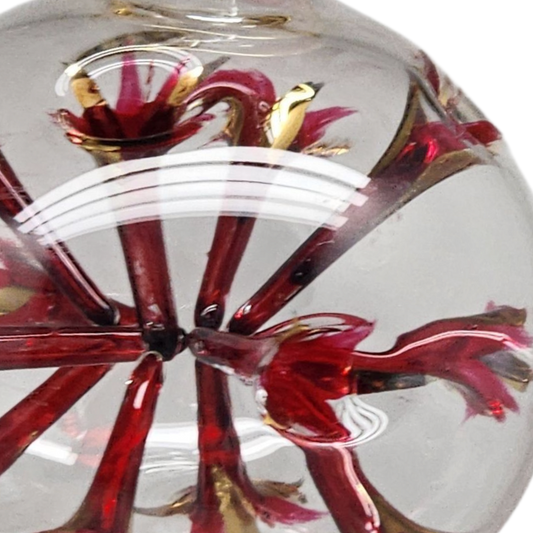 Ruby red starburst glass ornament, blown globe with gold accents on Tampa Home & Garden Store