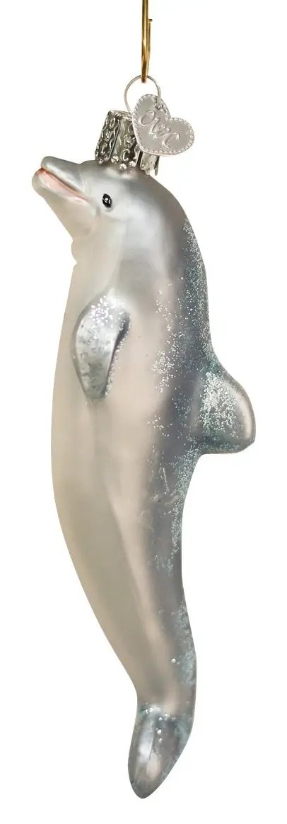 Old World Christmas Playful Dolphin ornament with glittery silver finish and a heart charm, hanging ornament on Tampa Home & Garden Store