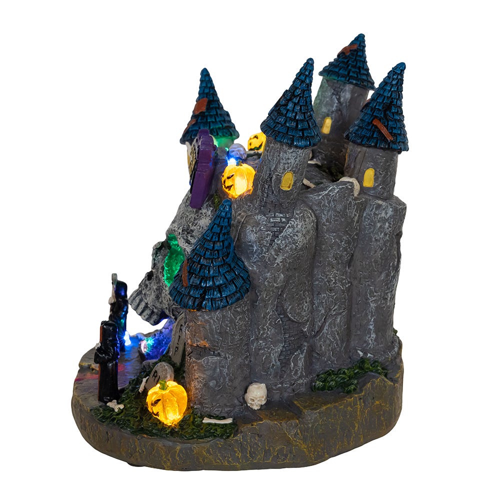 Castillo de calavera iluminado con entrada LED que cambia de color