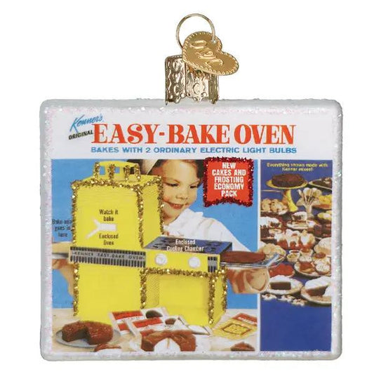 Easy Bake Oven glass ornament by Old World Christmas with gold cap and retro packaging artwork on Tampa Home & Garden Store