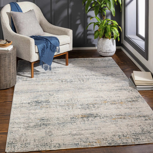 Rendlesham Luxe Rug in cream and teal with a subtle distressed look in a modern living room on Tampa Home & Garden Store