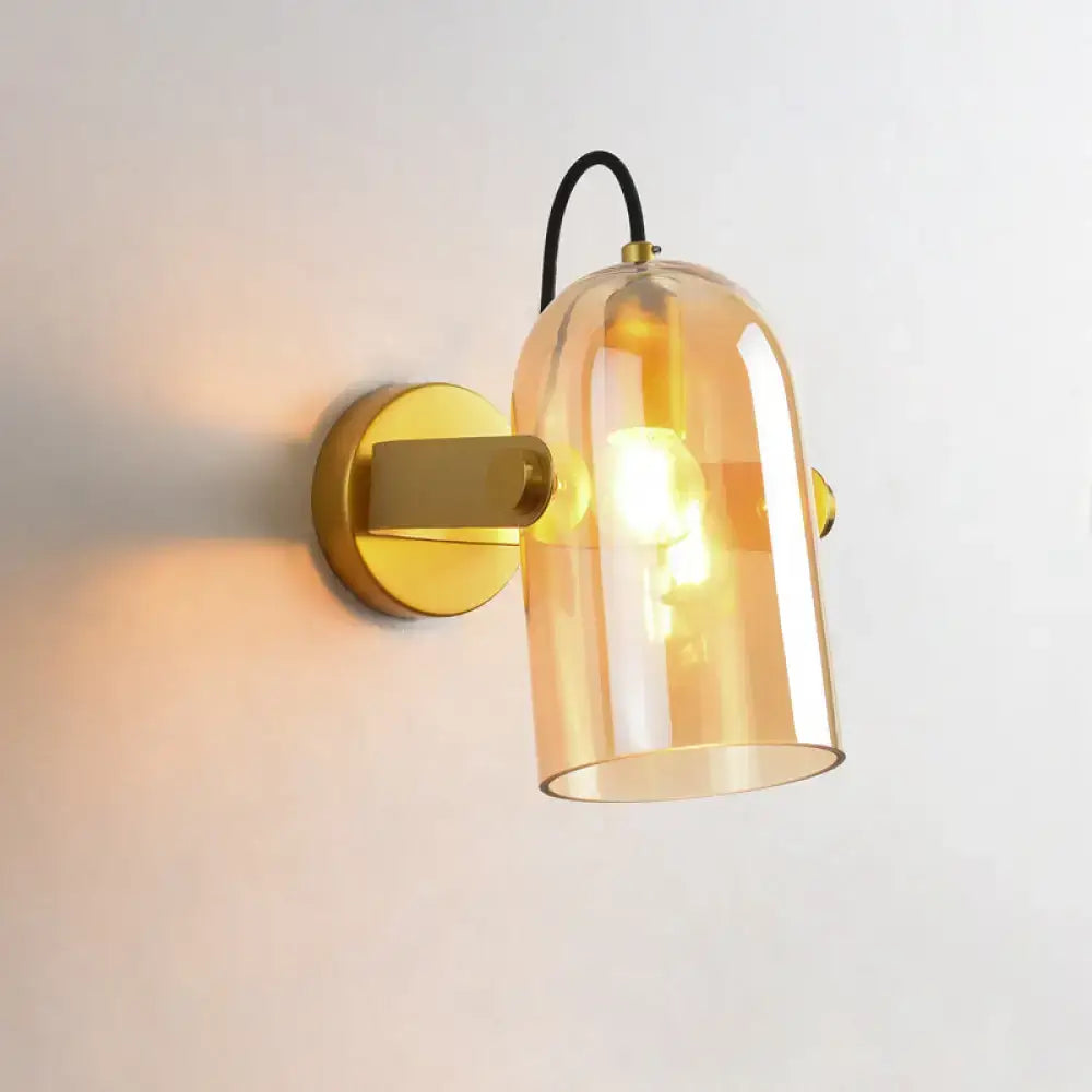 Brass Cloche Sconce Light by Decorbites with amber glass shade, wall-mounted on Tampa Home & Garden Store
