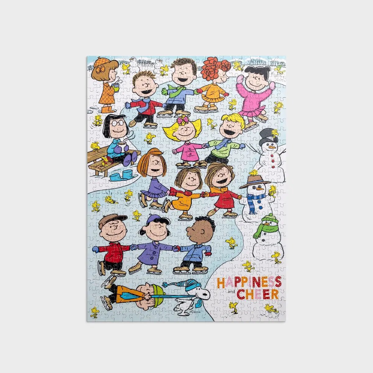 Peanuts Happiness and Cheer 550-piece puzzle by The Country Christmas Loft of kids skating on Tampa Home & Garden Store