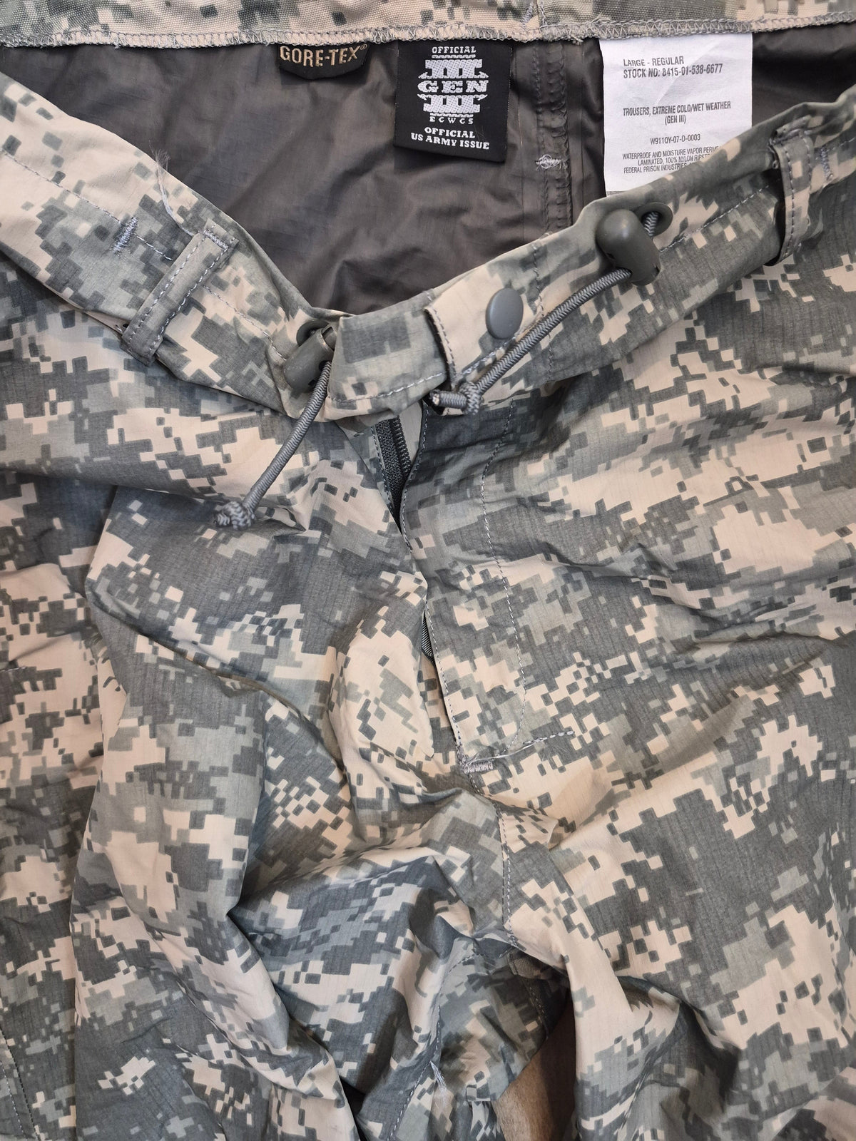 Fury28 ECWCS Gen III Level 6 ACU Gore-Tex rain pants in ACU camouflage with drawstring on Tampa Home & Garden Store