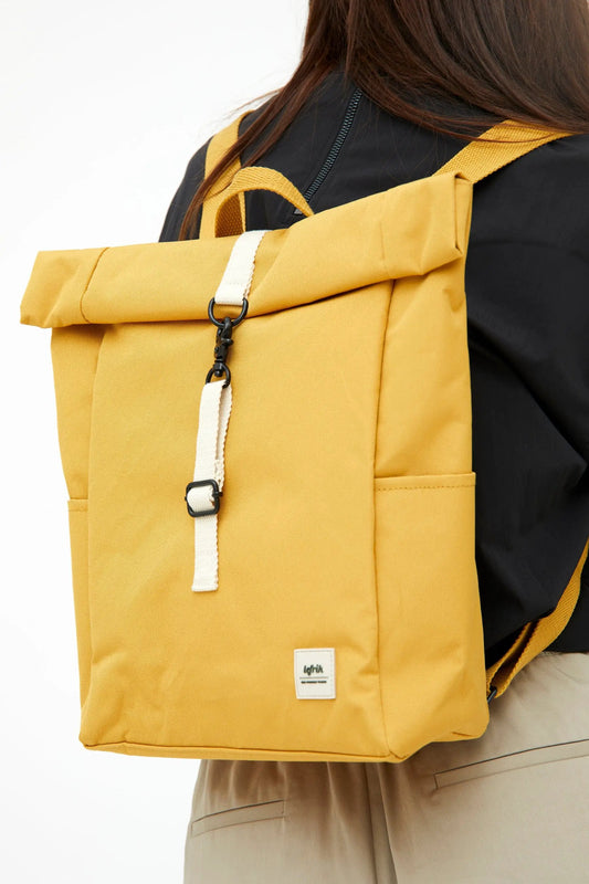 Roll Mini Backpack Mustard canvas with white strap and Lefrik USA tag on Tampa Home & Garden Store