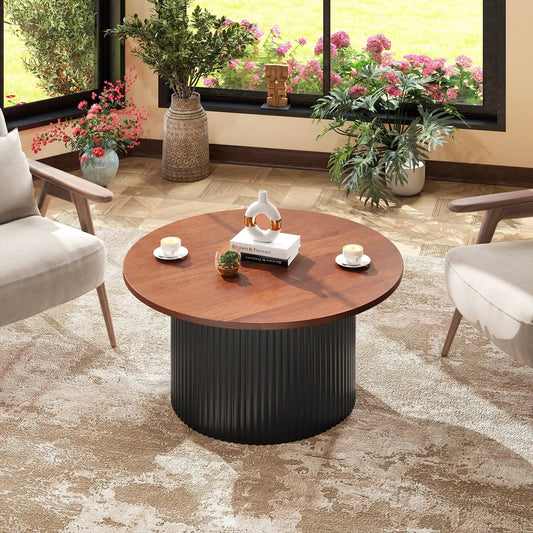 Round walnut coffee table with solid wood frame and ribbed black metal base on Tampa Home & Garden Store