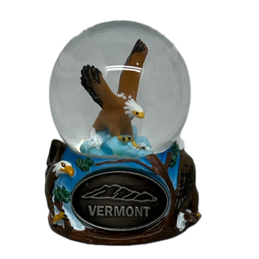Eagle snowglobe with Vermont emblem, 2.25in glass globe atop a scenic base with two eagles on Tampa Home & Garden Store