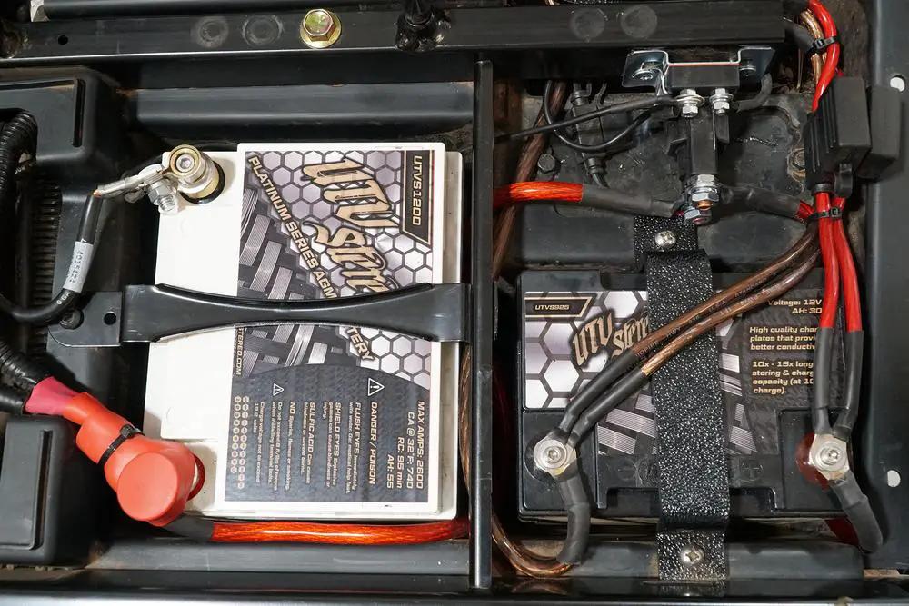 Polaris RZR 2nd Battery Kit with Isolated System, dual white and black batteries, red cables on Tampa Home & Garden Store