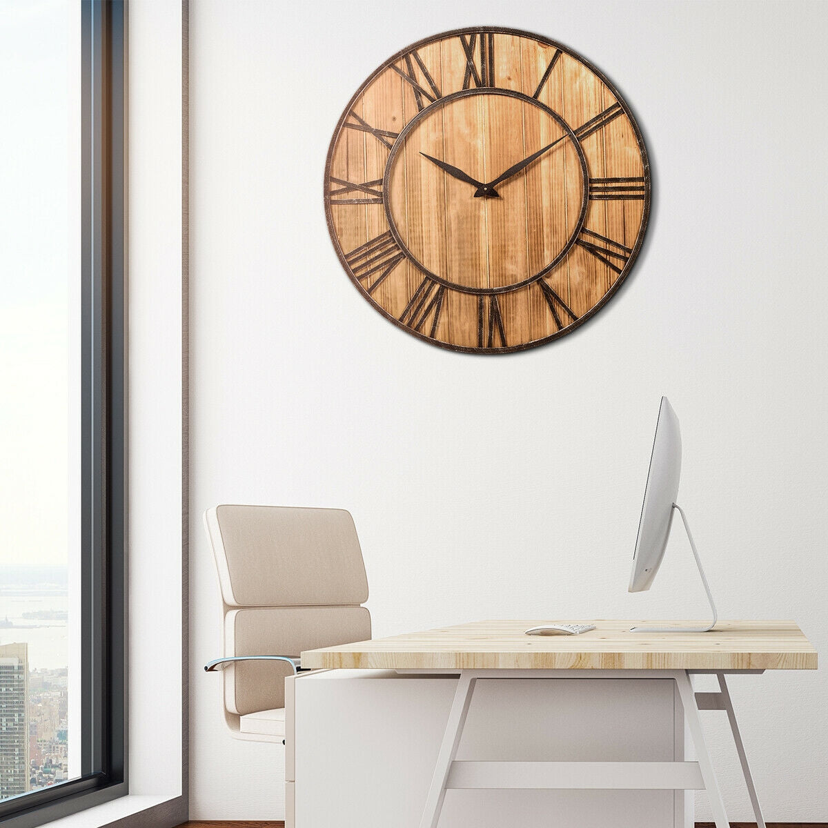 27 inch round wooden wall clock with Roman numerals and rustic finish in an office setting on Tampa Home & Garden Store
