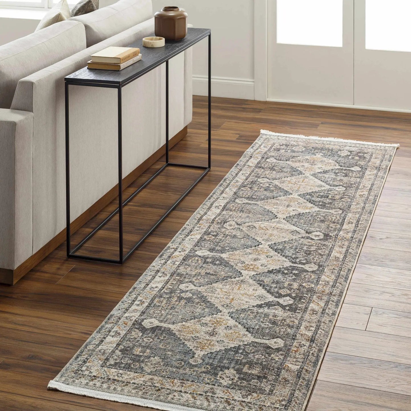 Lyam Luxe Southwestern Rug with Fringes gray-blue tones and intricate pattern with fringed ends on Tampa Home & Garden Store